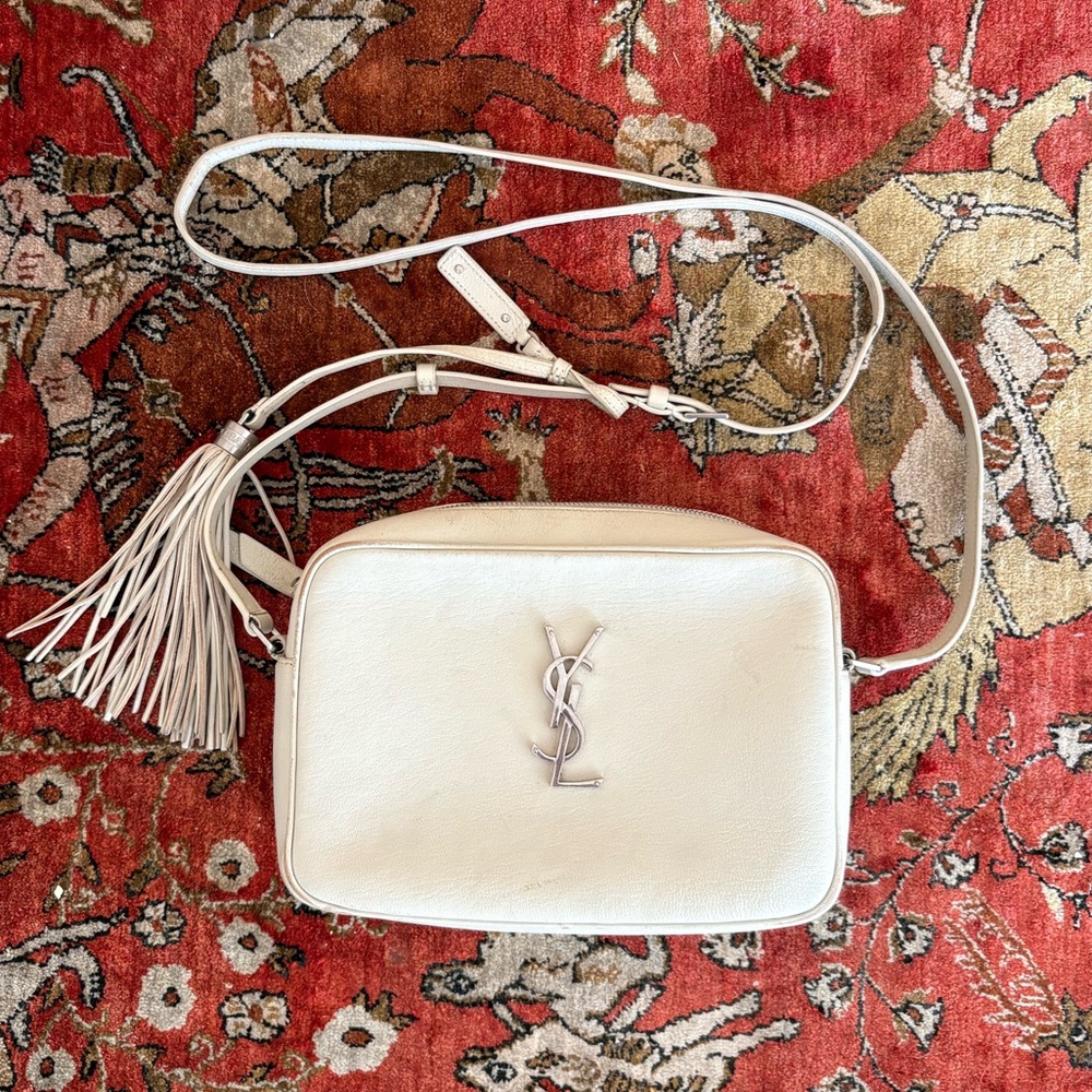 Saint Laurent white leather camera bag with tassel